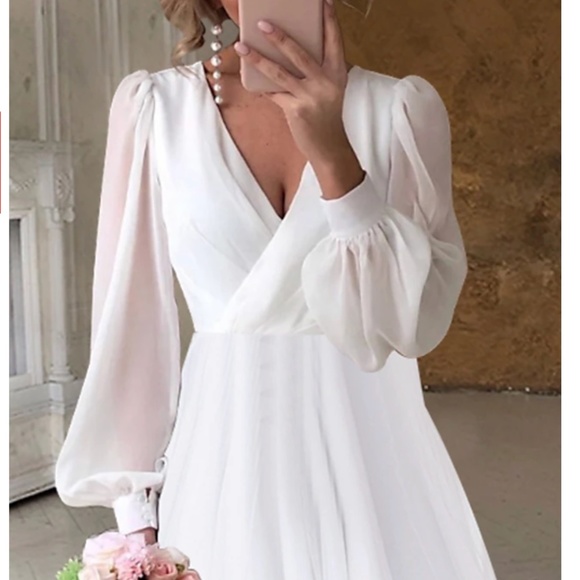 White Wedding Dress with Timeless Elegance - Picture 4 of 16